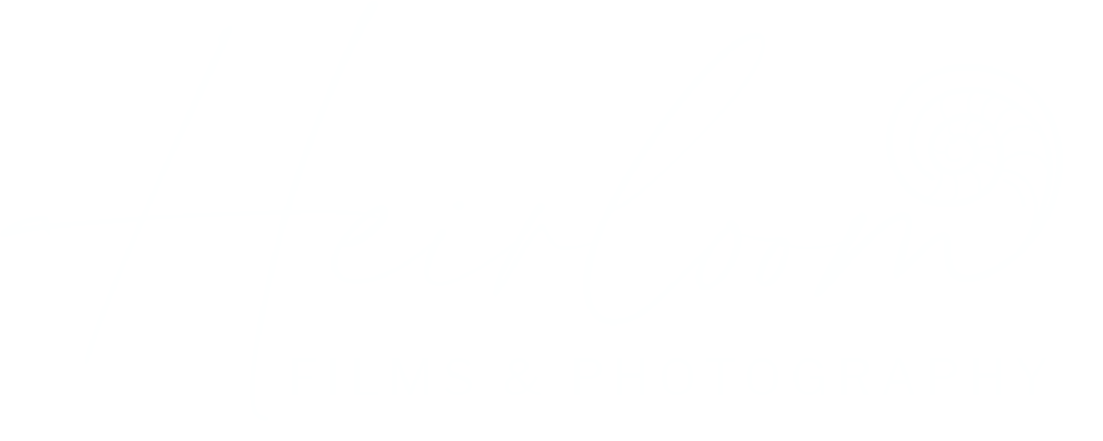 Heirloom Films & Photography logo with handwritten script and ammonite shell emblem