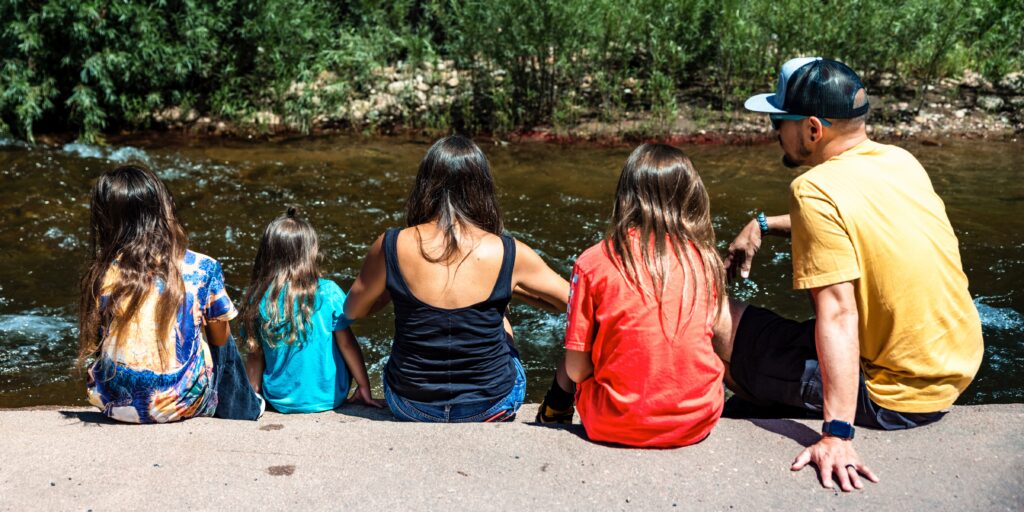 Family enjoying Boulder Creek during outdoor Photography Services session