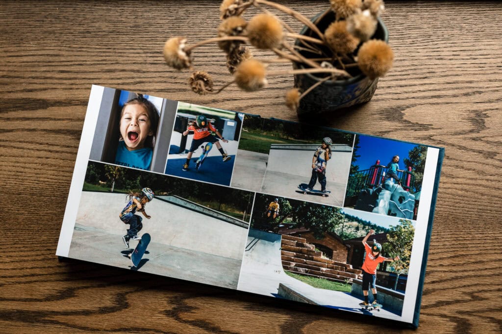 Skateboarding photo book on wooden table highlighting action Photography Services.