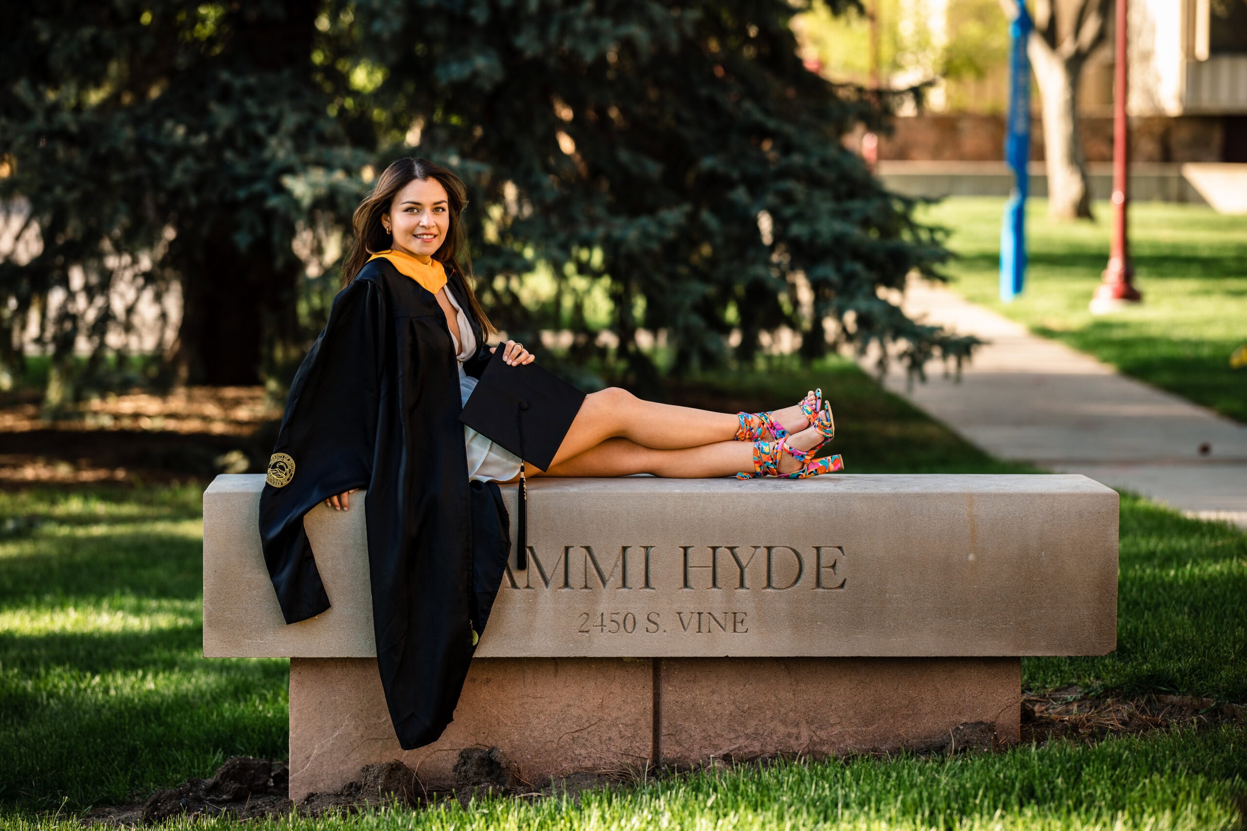 Denver University graduate at Ammi Hyde Hall.