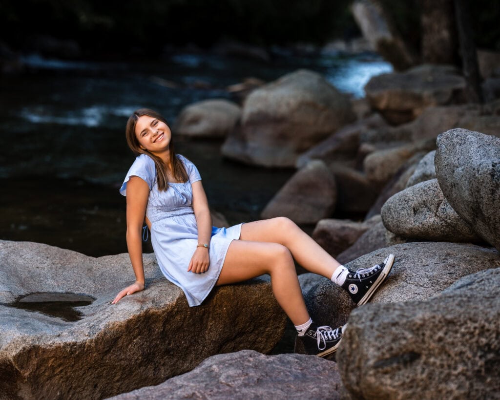 Side-by-side senior portraits in Boulder, Colorado, showing peaceful elegance in a on Boulder Creek.