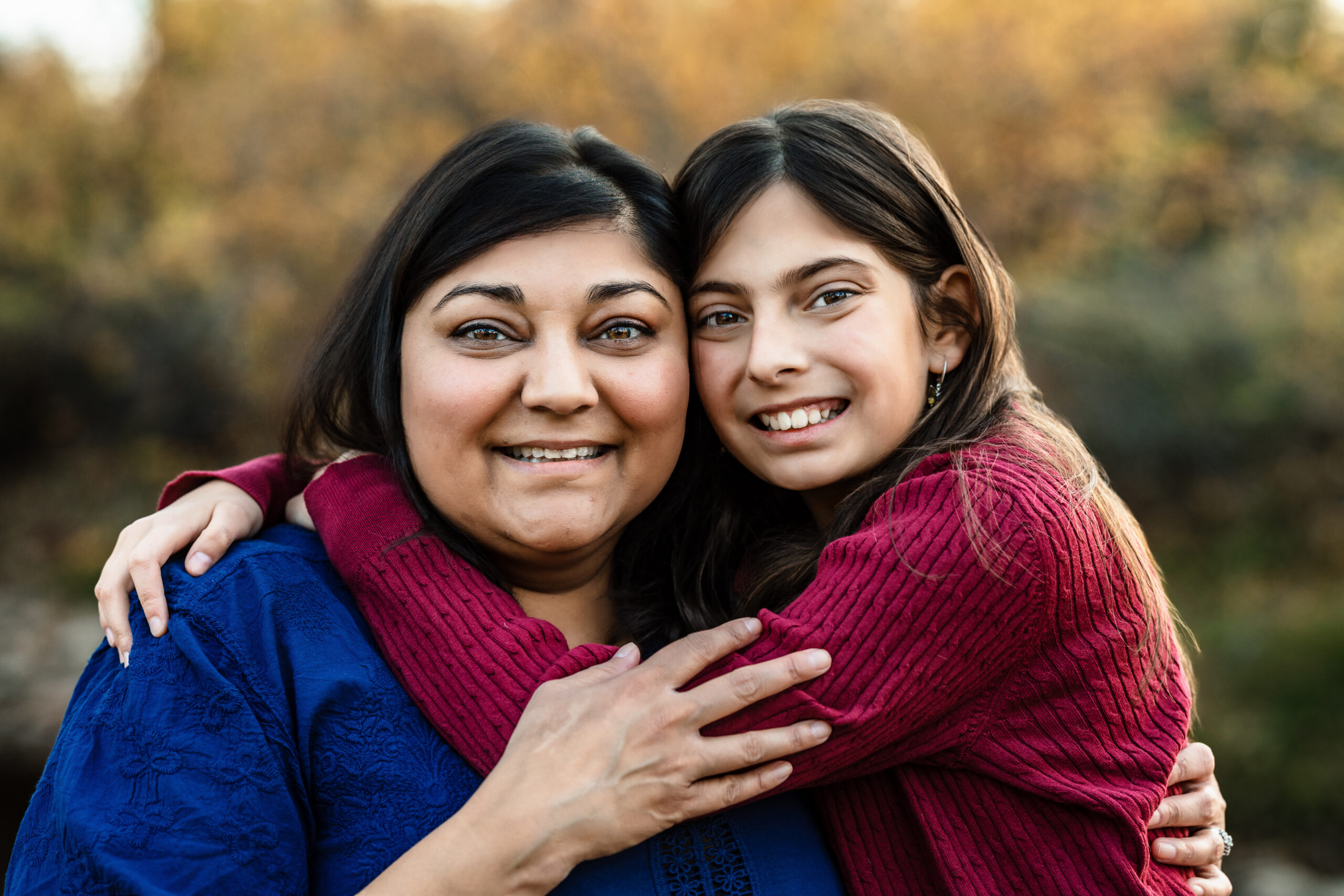 Mother and daughter smiling at Fall Family Mini Sessions in Colorado